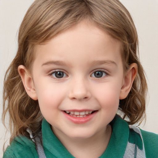 Joyful white child female with medium  brown hair and grey eyes