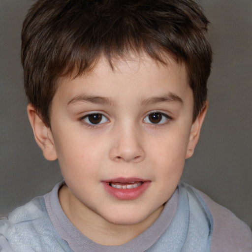 Joyful white child male with short  brown hair and brown eyes