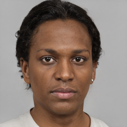 Neutral black young-adult female with short  black hair and brown eyes