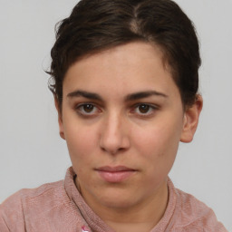 Neutral white young-adult female with short  brown hair and brown eyes