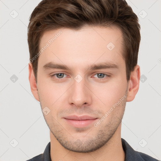 Neutral white young-adult male with short  brown hair and grey eyes