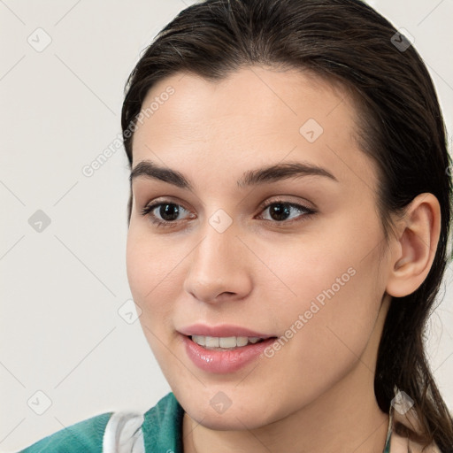 Joyful white young-adult female with medium  brown hair and brown eyes