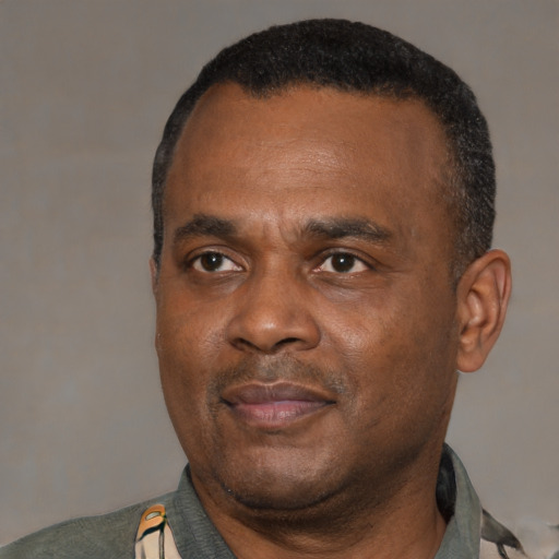 Neutral latino adult male with short  black hair and brown eyes