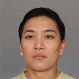 Neutral asian young-adult female with short  brown hair and brown eyes