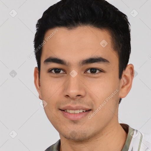 Joyful asian young-adult male with short  black hair and brown eyes