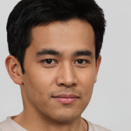 Neutral asian young-adult male with short  brown hair and brown eyes