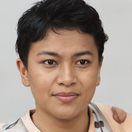 Joyful asian young-adult female with short  brown hair and brown eyes