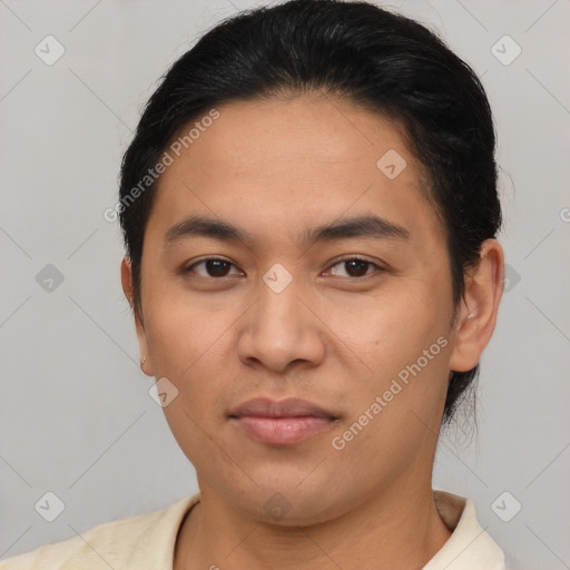 Joyful asian young-adult male with short  brown hair and brown eyes