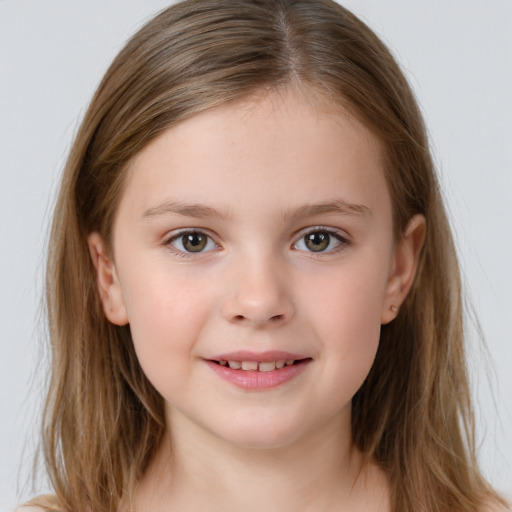 Joyful white child female with medium  brown hair and brown eyes