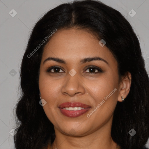 Joyful latino young-adult female with long  brown hair and brown eyes