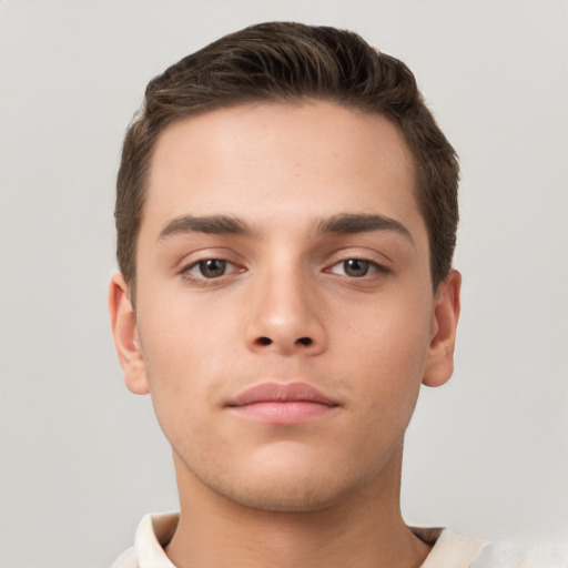 Neutral white young-adult male with short  brown hair and brown eyes