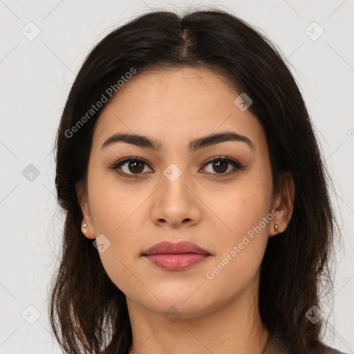 Joyful latino young-adult female with medium  brown hair and brown eyes