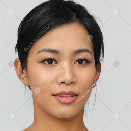 Joyful asian young-adult female with medium  black hair and brown eyes