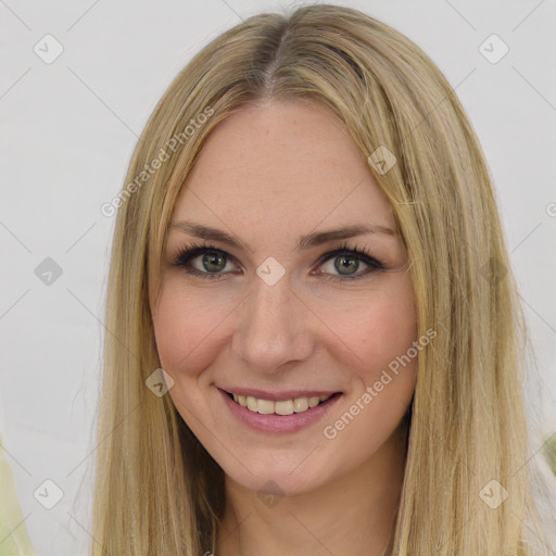 Joyful white young-adult female with long  brown hair and green eyes