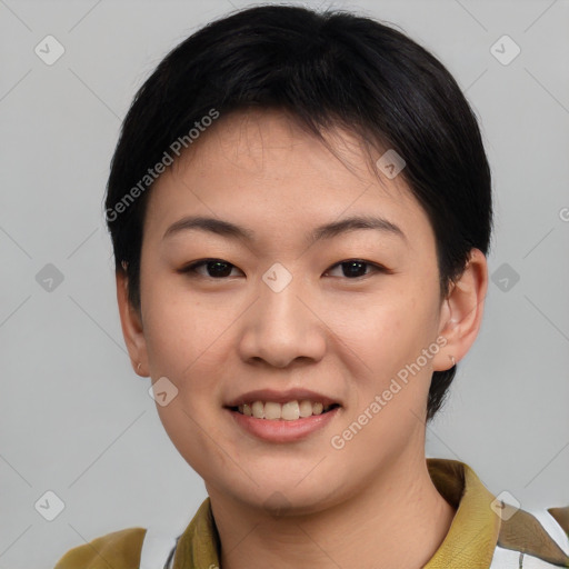 Joyful asian young-adult female with short  black hair and brown eyes