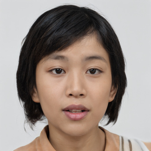 Neutral asian young-adult female with medium  black hair and brown eyes