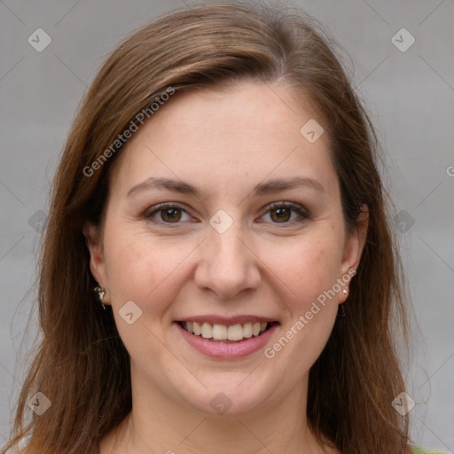 Joyful white young-adult female with long  brown hair and grey eyes