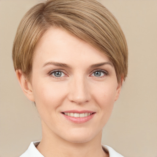 Joyful white young-adult female with short  brown hair and grey eyes