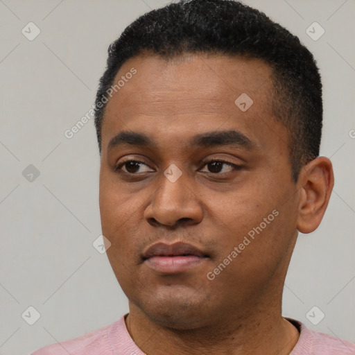 Neutral latino young-adult male with short  black hair and brown eyes