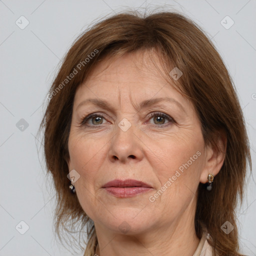 Joyful white adult female with medium  brown hair and grey eyes