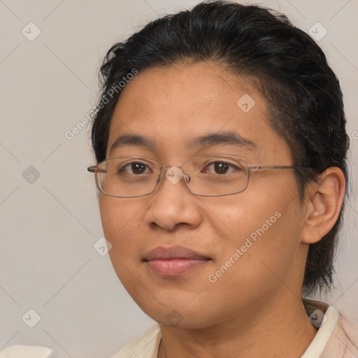 Joyful latino adult female with short  brown hair and brown eyes