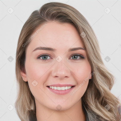 Joyful white young-adult female with long  brown hair and blue eyes