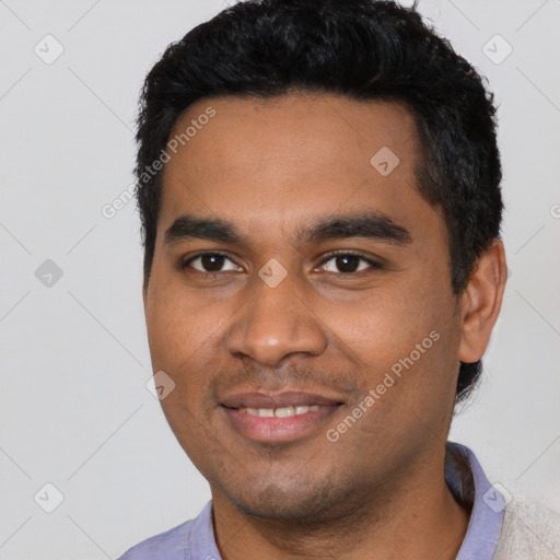 Joyful black young-adult male with short  black hair and brown eyes