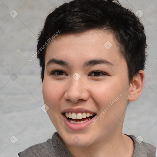 Joyful asian young-adult female with short  brown hair and brown eyes