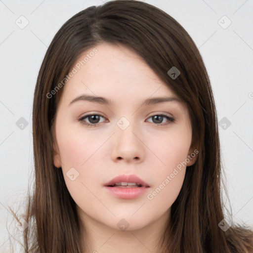 Neutral white young-adult female with long  brown hair and brown eyes