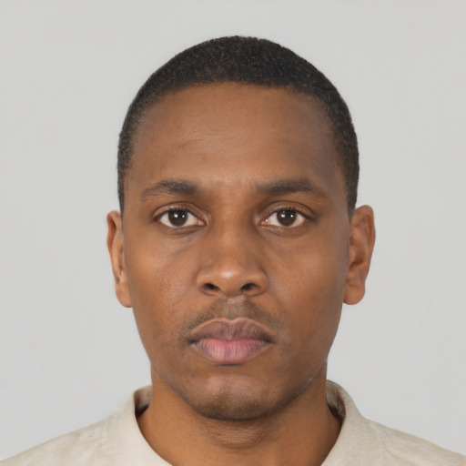Neutral black young-adult male with short  black hair and brown eyes