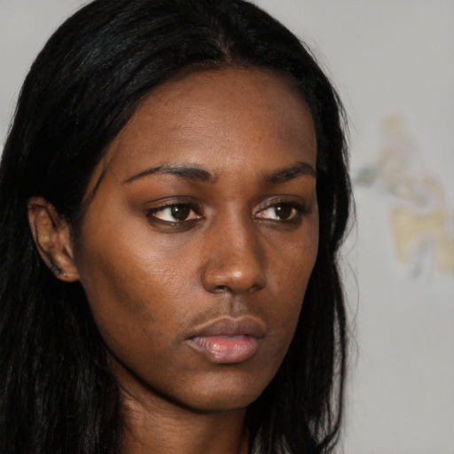 Neutral black young-adult female with long  black hair and brown eyes