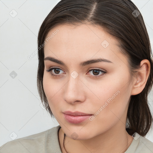 Neutral white young-adult female with medium  brown hair and brown eyes