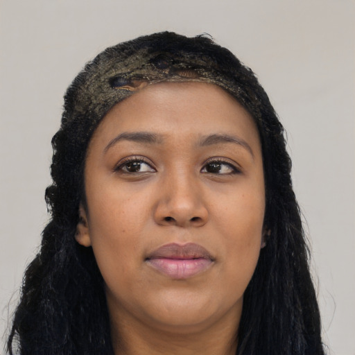 Joyful asian young-adult female with long  black hair and brown eyes