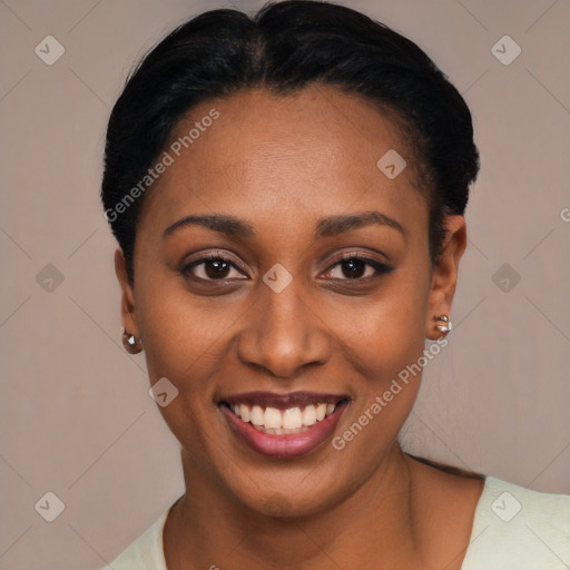 Joyful black young-adult female with short  black hair and brown eyes