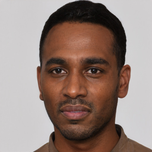 Neutral black young-adult male with short  black hair and brown eyes