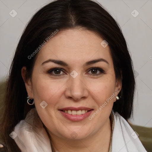 Joyful white adult female with medium  brown hair and brown eyes