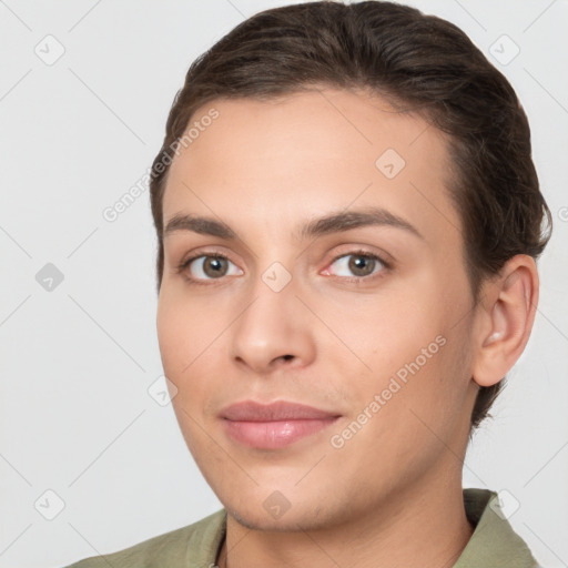 Joyful white young-adult female with short  brown hair and brown eyes