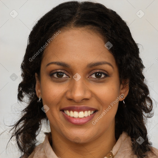 Joyful black young-adult female with long  brown hair and brown eyes