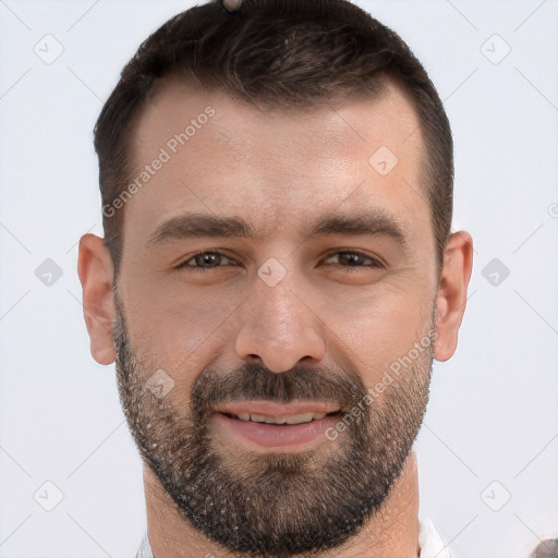 Joyful white adult male with short  brown hair and brown eyes