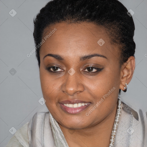 Joyful black young-adult female with short  brown hair and brown eyes