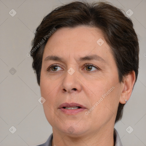 Joyful white adult female with short  brown hair and brown eyes