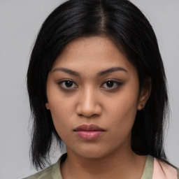 Neutral asian young-adult female with medium  black hair and brown eyes