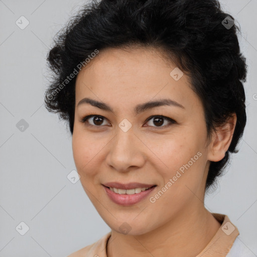 Joyful latino young-adult female with short  brown hair and brown eyes
