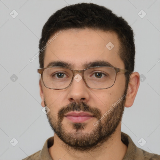 Neutral white young-adult male with short  brown hair and brown eyes