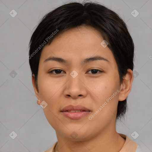 Joyful asian young-adult female with short  brown hair and brown eyes