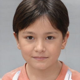 Joyful white child female with short  brown hair and brown eyes