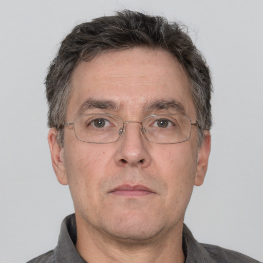 Neutral white middle-aged male with short  brown hair and brown eyes