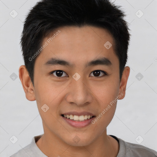 Joyful asian young-adult male with short  brown hair and brown eyes