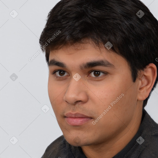 Neutral latino young-adult male with short  brown hair and brown eyes