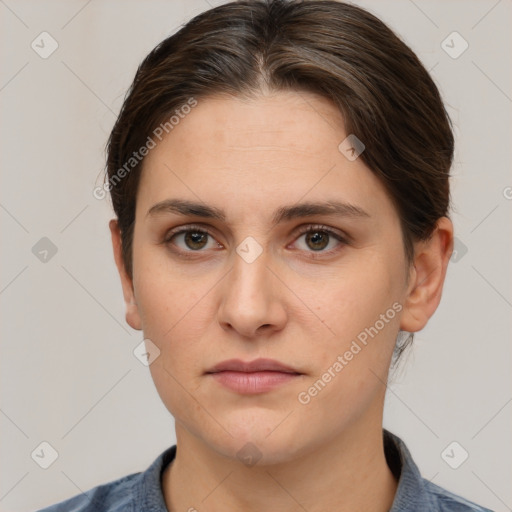 Neutral white young-adult female with short  brown hair and brown eyes